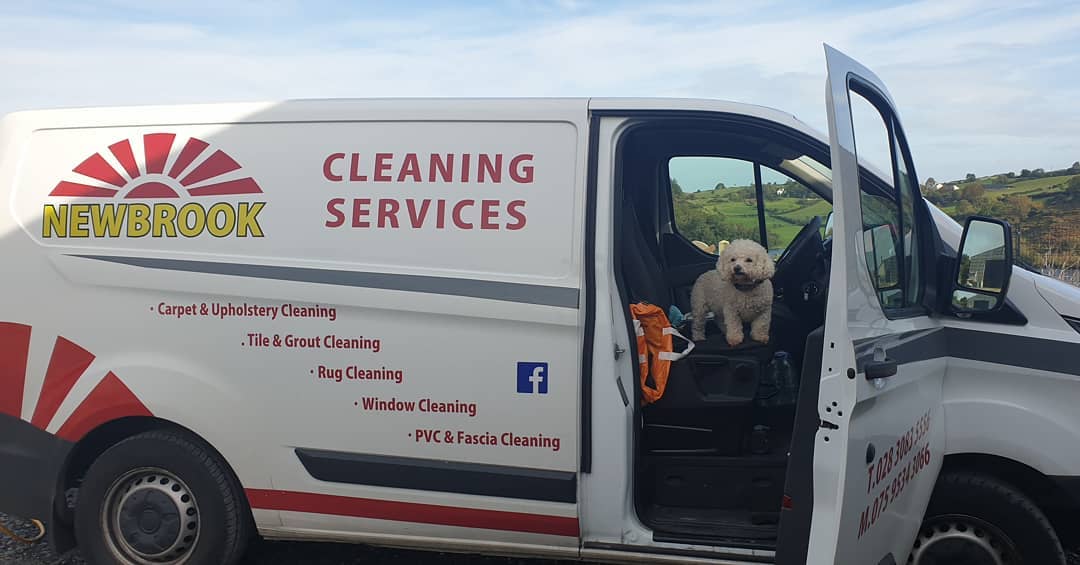 Newbrook Cleaning branded van on site